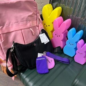 lululemon athletica Purple Key Pouch with Pink Kids Backpack and Black Crossbody